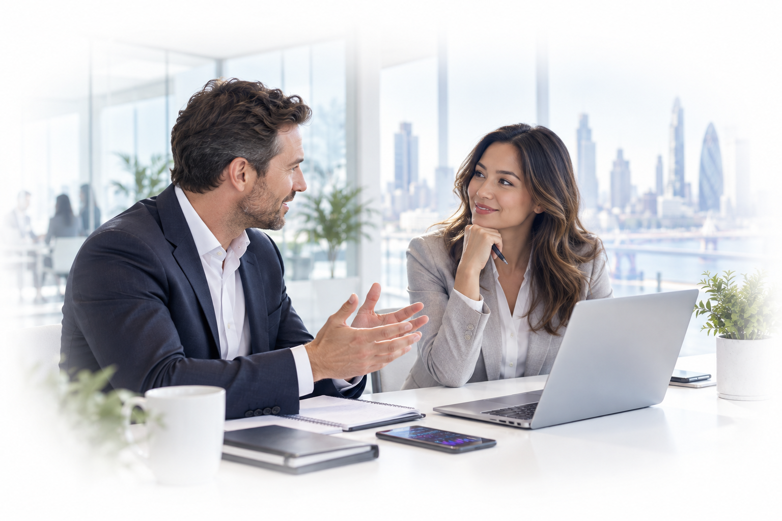 Business professionals discussing a project with a city skyline behind them